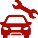Red car with a wrench on top of it, set against a white background